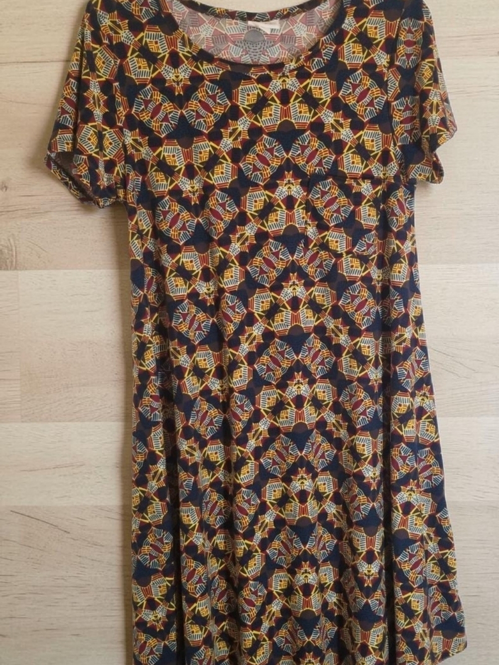 LuLaRoe Multicolor Geometric Print Top in Blue, Burgundy, Yellow